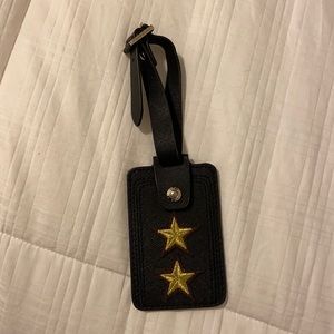 Henri Bendel luggage tag with star patches